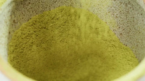 Matcha green tea cooking process, japanese powder green tea in a bowl with Stock Footage 309623012