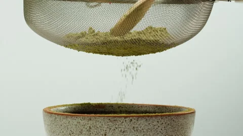 Matcha green tea cooking process, japanese powder green tea in a bowl with Stock Footage 309623470