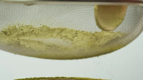 Matcha green tea cooking process, japanese powder green tea in a bowl with Stock Footage 309626307