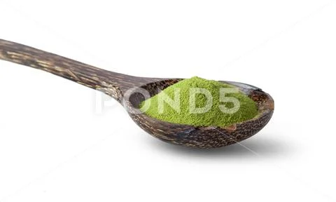 Matcha green tea powder in wood spoon isolated on white background Stock-Fotos