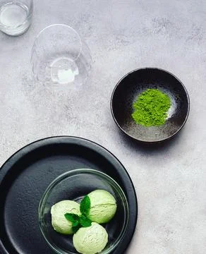 Matcha Ice Cream with Mint Leaf in bright grey background Stock Photos