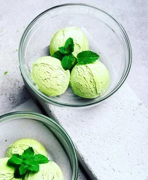 Matcha Ice Cream with Mint Leaf in bright grey background Stock Photos