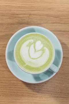 Matcha latte in ceramic cup Stock Photos