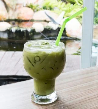 Matcha latte iced on the table Stock Photos
