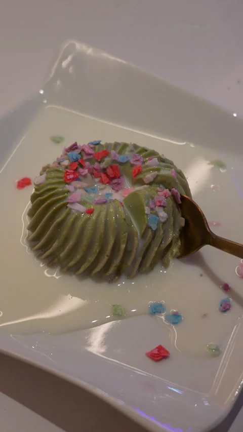 Matcha Pudding Dessert on White Plate Stock Footage 342615376