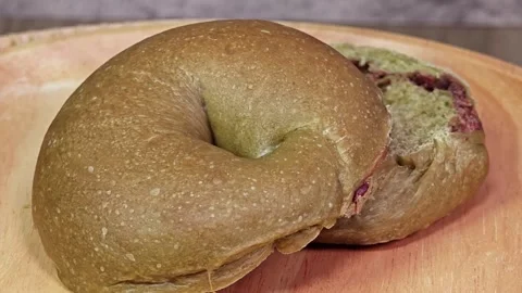 Matcha red bean bagel for breakfast. Stock Footage 309275148