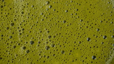 Matcha tea foam texture macro, rotation Stock Footage 335505533