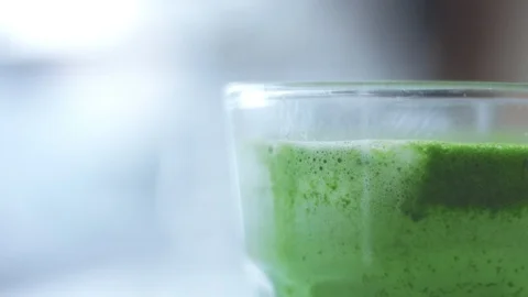 Matcha tea preparation in cafe by mixed race barman Stock Footage 87908397