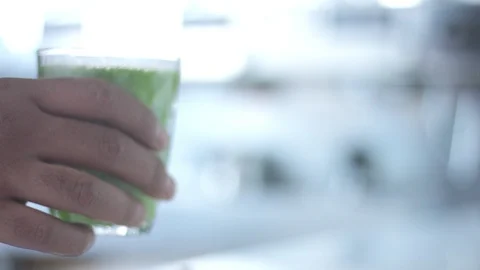 Matcha tea preparation in cafe by mixed race barman Stock Footage 87908414