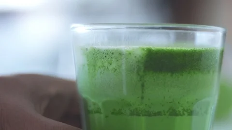 Matcha tea preparation in cafe by mixed race barman Video stock 87908430