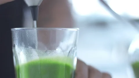 Matcha tea preparation in cafe by mixed race barman Stock Footage 87908572