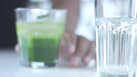 Matcha tea preparation in cafe by mixed race barman Stock Footage 87908691