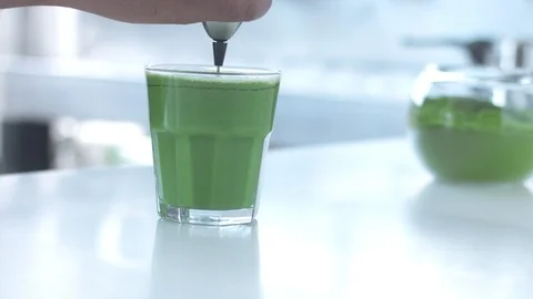 Matcha tea preparation in cafe by mixed race barman Stock Footage 87908735