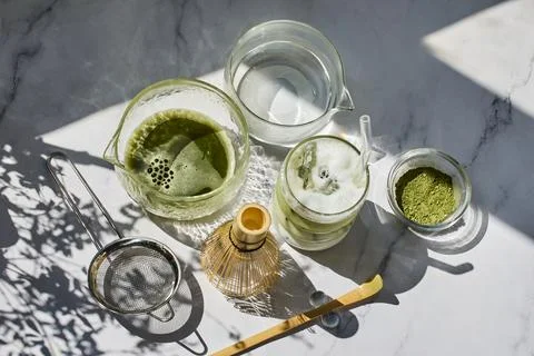 Matcha Tea Preparation. Flat lay of matcha tea ingredients and tools Stock-Fotos