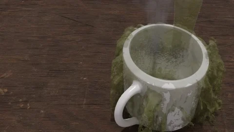 Matcha tea served hot in splash cup until spilled on wooden board Stock Footage 190121806