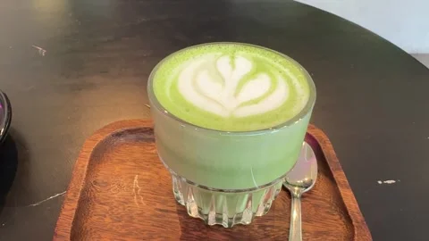 Matcha tee on the table. healthy hot drink. Stock Footage 264706632
