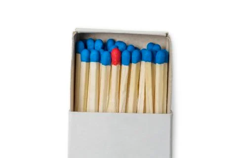 Matchbox with blue and one red matches Stock Photos