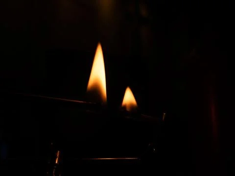 Matches and fire on a black background Stock Photos