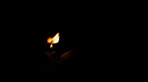 Matches and fire on a black background Stock Photos