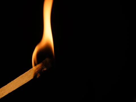 Matches and fire on a black background Stock Photos