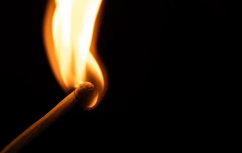 Matches and fire on a black background Stock Photos