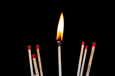 Matches with black background. Stock Photos