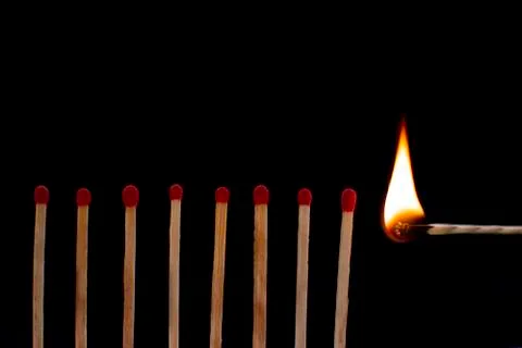 Matches with black background. Stock Photos
