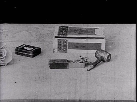 Matches, cigarettes, and a corncob pipe come to life (via stop-motionƒ Stock Footage 75280544