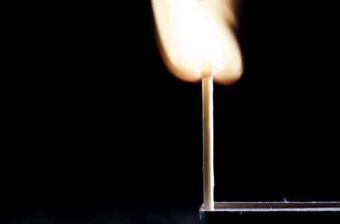 Matches on a dark background Stock Photos