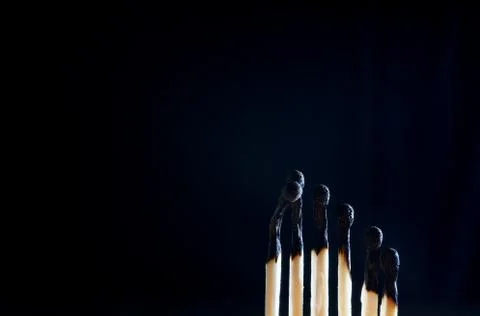 Matches on a dark background Stock Photos