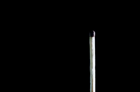 Matches on a dark background Foto stock