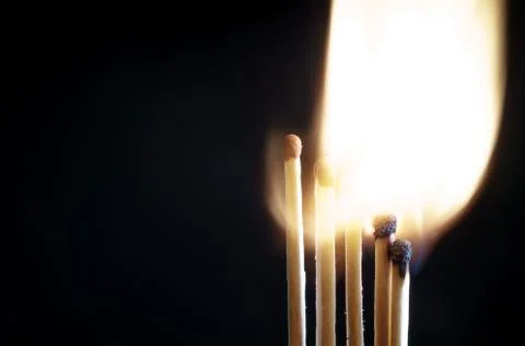 Matches on a dark background Stock Photos
