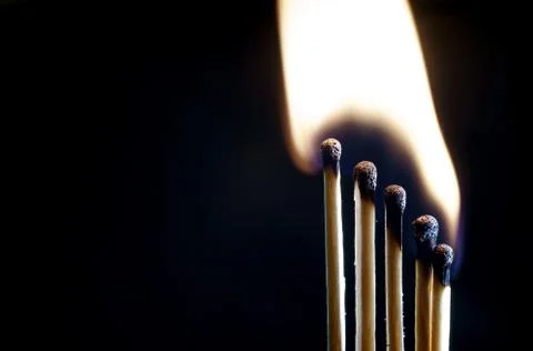 Matches on a dark background Foto stock