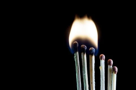 Matches on a dark background Foto stock