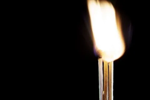 Matches on a dark background Stock Photos
