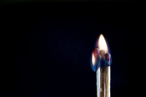 Matches on a dark background Stock Photos