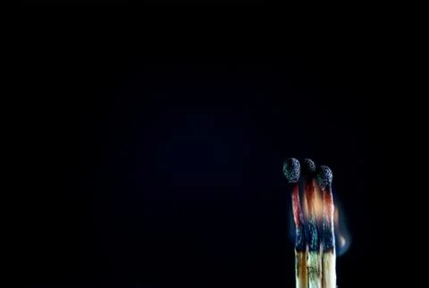 Matches on a dark background Stock Photos