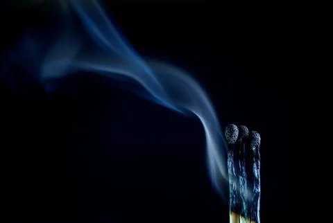 Matches on a dark background Stock Photos