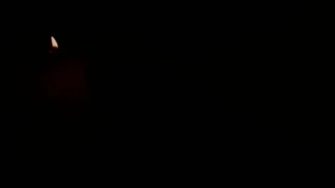Matches light up one by another in series on black background. Stock Footage 107654974