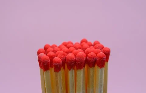 Matches on a pink background Stock Photos
