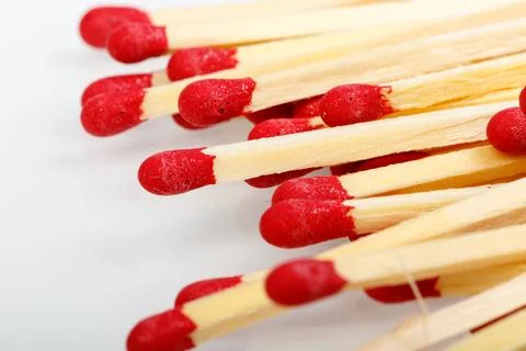 Matches with a red head on a white background Stock Photos