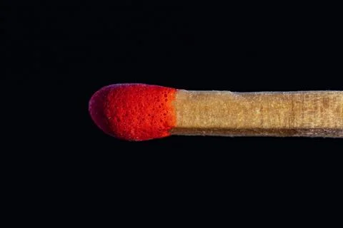 Matchstick on black background, close-up Stock Photos