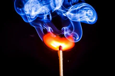 Matchstick igniting Stock Photos