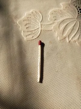 Matchstick on a table Stock Photos