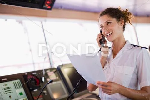 Mate Of A Ship Doing A Phone Call