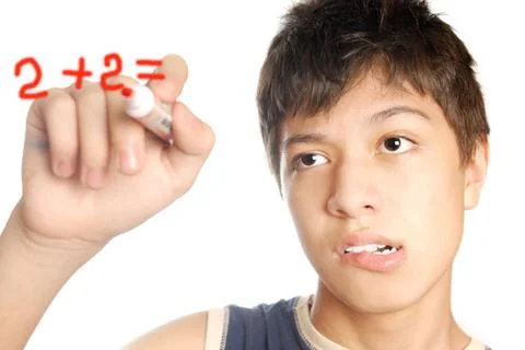 Matematical problem Schoolboy solving the mathematical problem with red fe... Foto stock