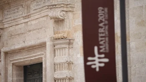 Matera flags, Pulling focus, rack focusing, flags,  Matera Sassi Video stock 83704874