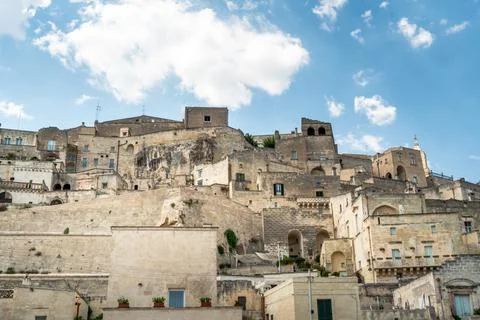 Matera Sassi district skyline with ancient cave dwellings and limestone houses Stock Photos