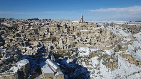 Matera Sassi with snow drone flight Video stock 106068741
