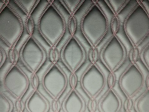 Material leather texture. Thread pattern on the black leather. Stock Photos